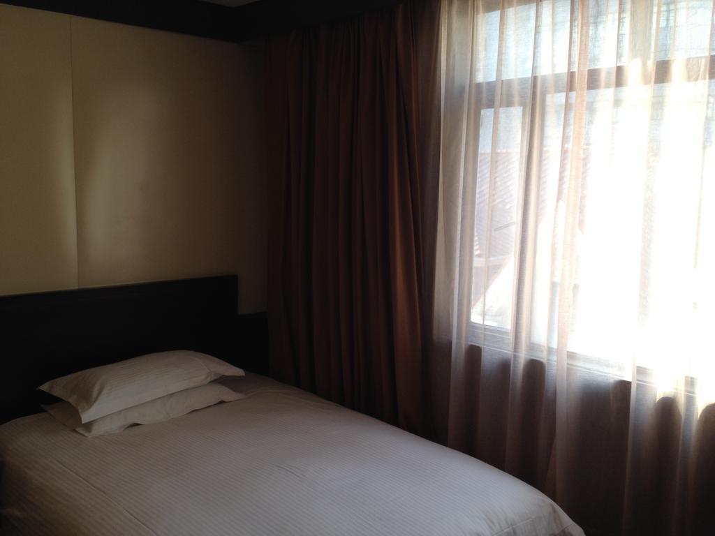 Baolong Homelike Hotel - Henglong Hotel Jingan Экстерьер фото