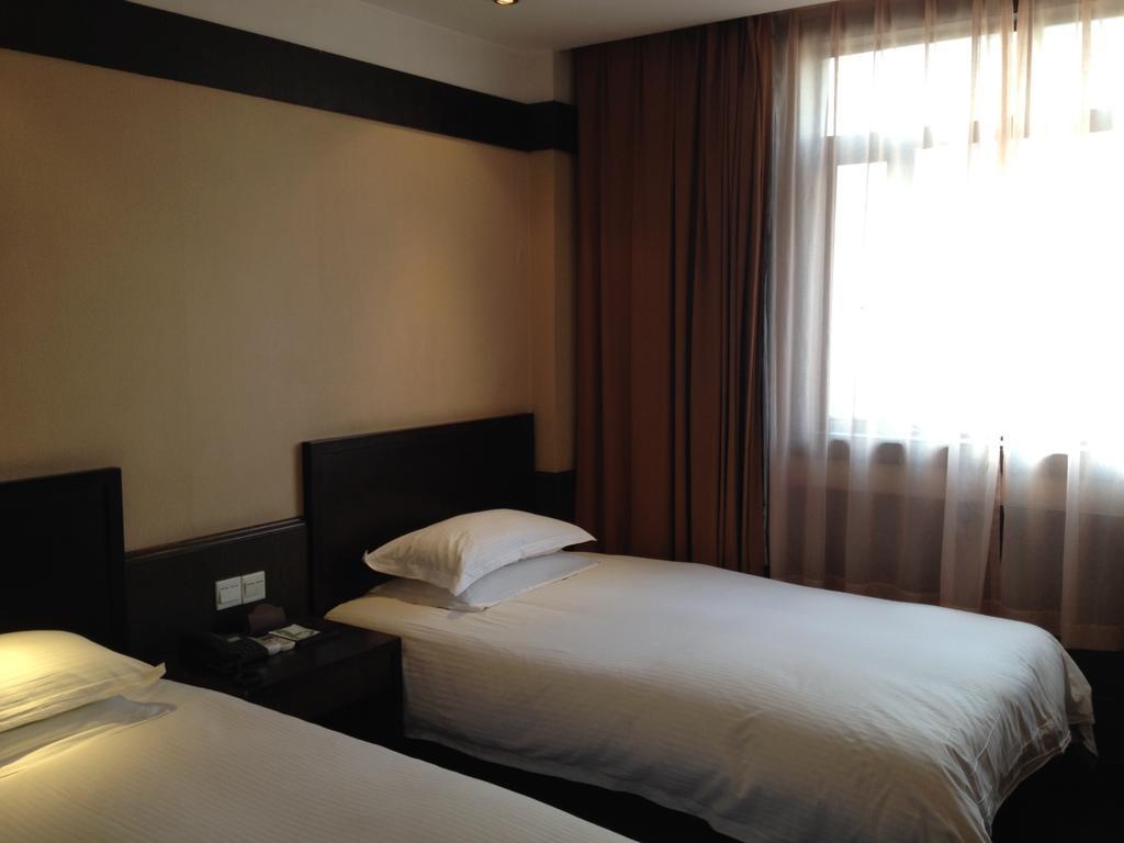 Baolong Homelike Hotel - Henglong Hotel Jingan Экстерьер фото